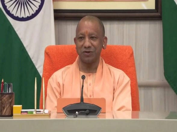 India News | UP CM Yogi Adityanath Celebrates as BJP Set to Take Control of Assam, West Bengal