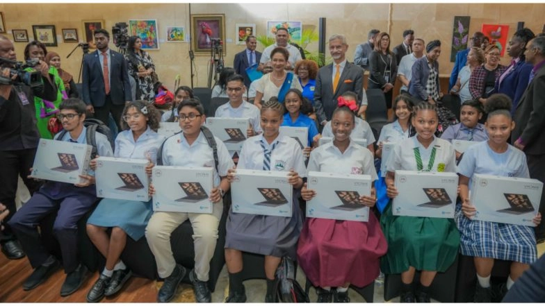 World News | EAM Meets Trinidad and Tobago PM Persad-Bissessar, Hands over Made-in-India Laptops