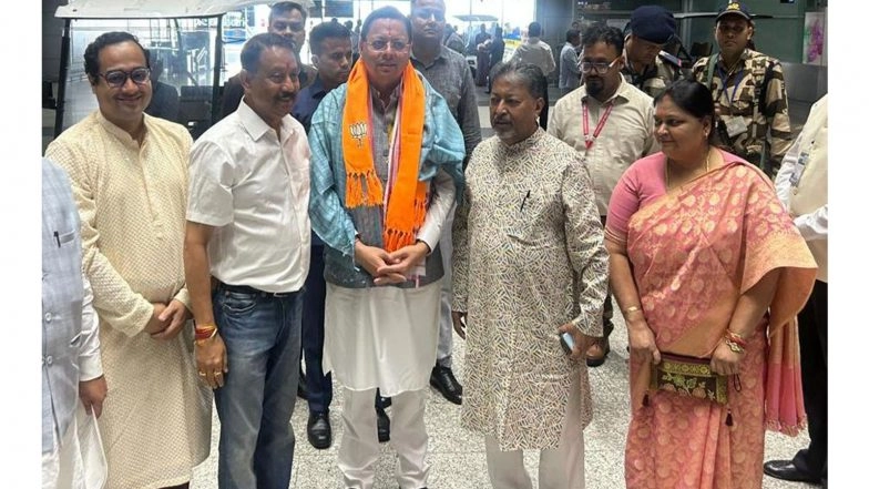 India News | Uttarakhand CM Dhami Arrives in Kolkata for Suvendu Adhikari's Oath-taking Ceremony
