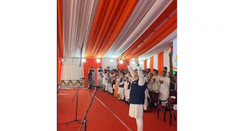India News | PM Modi Bows on Stage to Greet Public at Bengal Govt Swearing-in Ceremony