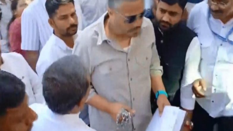 India News | Rohit Pawar Stages Symbolic Protest at Pune CID Office, Slams Lack of Progress over Ajit Pawar's Plane Crash Probe
