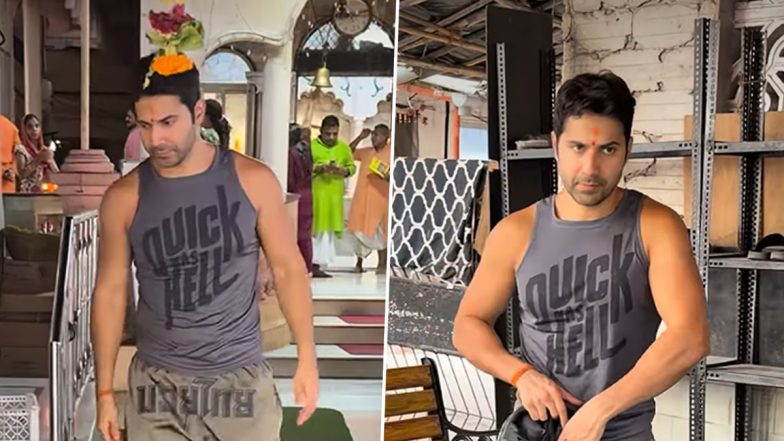 Varun Dhawan Seeks Blessings at Mumbai Temple in Vest and Shorts; Angry Netizens Ask &lsquo;Park Mein Ghoomne Aaye Ho?&rsquo; (Watch Video)