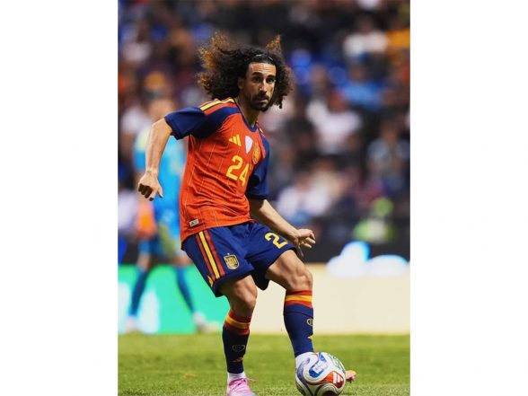 Sports News | Spain Midfielder Cucurella’s FIFA WC Lucky Charms: Wife’s Red Pajama Top and Kids’ Handmade Keychains Sports News | Spain Midfielder Cucurella’s FIFA WC Lucky Charms: Wife’s Red Pajama Top and Kids’ Handmade Keychains