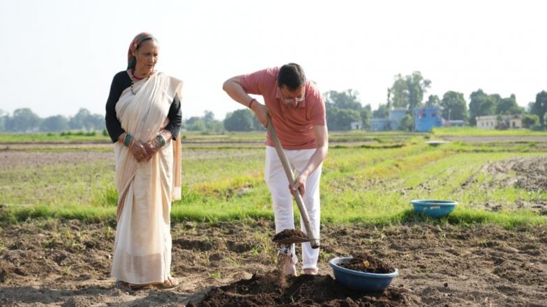 India News | Uttarakhand CM Dhami Promotes Organic Farming, Ploughs Field at Private Residence in Khatima