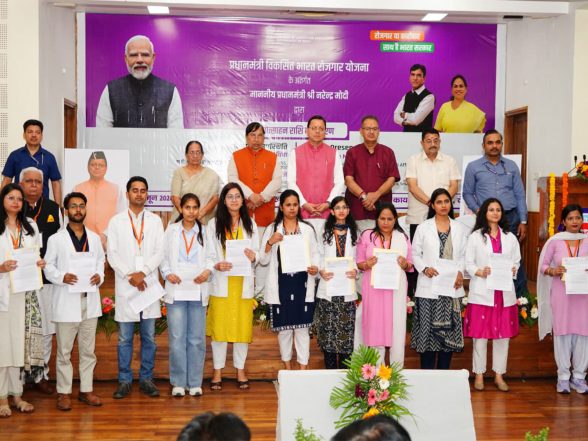 India News | Uttarakhand CM Dhami Celebrates Youth Empowerment: Honours Employers and Employees Under PM-VBRY