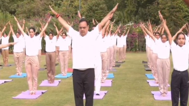 India News | Rajasthan CM Bhajanlal Sharma Practices Yoga with Women Police Personnel Ahead of International Yoga Day
