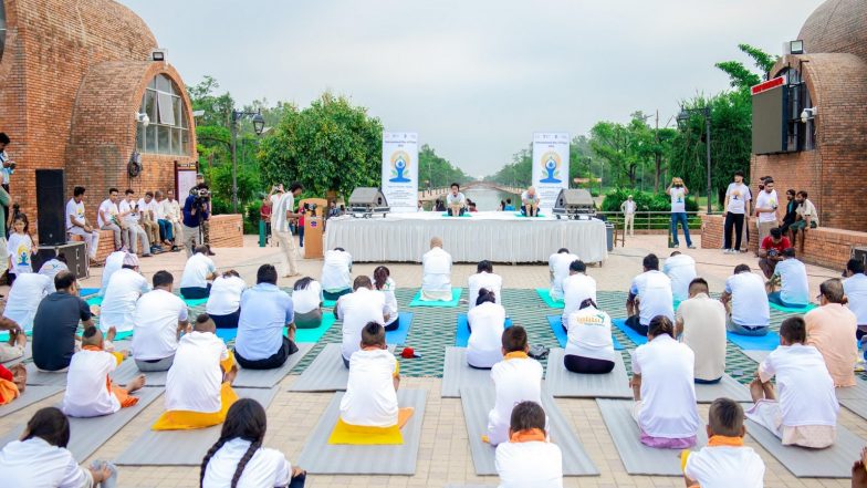 World News | Indian Embassy in Nepal, Lumbini Development Trust Organise Joint Yoga Session Ahead of International Day of Yoga