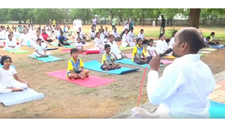 India News | Tamil Nadu: Over 500 People Perform Yoga in Tiruchirappalli on 12th International Yoga Day