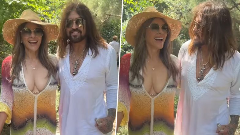 Elizabeth Hurley Rocks Plunging Boho Dress on Sun-Soaked French Escape With Boyfriend Billy Ray Cyrus (Watch Video)
