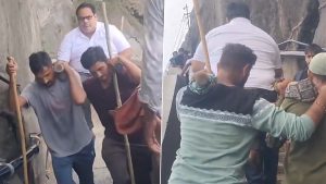 social-viral-Mount Girnar Viral Video Sparks Online Debate Over Pilgrims Being Carried in Palanquins