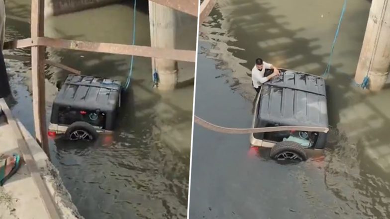 Haryana: Thar Falls Into Drain After Loses Control in Sonipat, Locals Rescue Him (Watch Video)