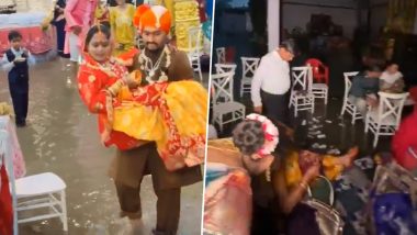Indore Viral Video: Groom Carries Bride Through Flooded Wedding Venue As Heavy Rain Inundates Marriage Garden