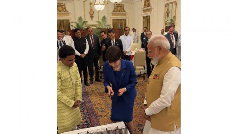 World News | Bikes, Beats and Bilaterals at 16th India-Japan Summit: Sanae Takaichi Tries Santoor During Delhi Luncheon with PM Modi