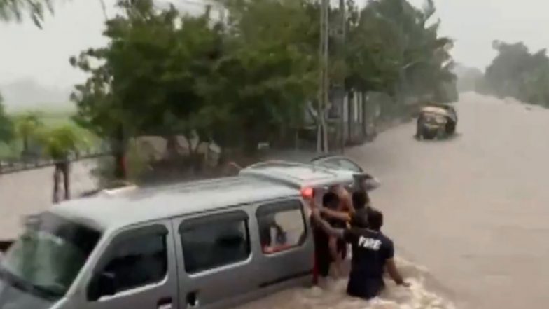 India News | Gujarat: Fire Department Rescues People Stranded in Floodwaters in Junagadh