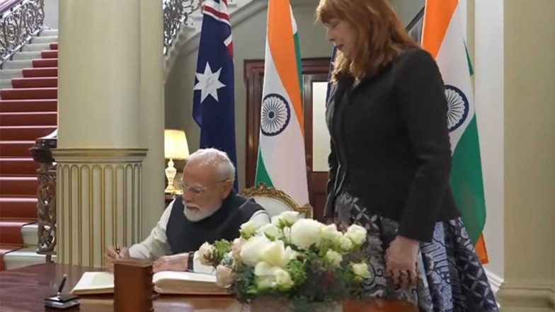 World News | PM Modi Signs Visitors' Book at Government House in Melbourne