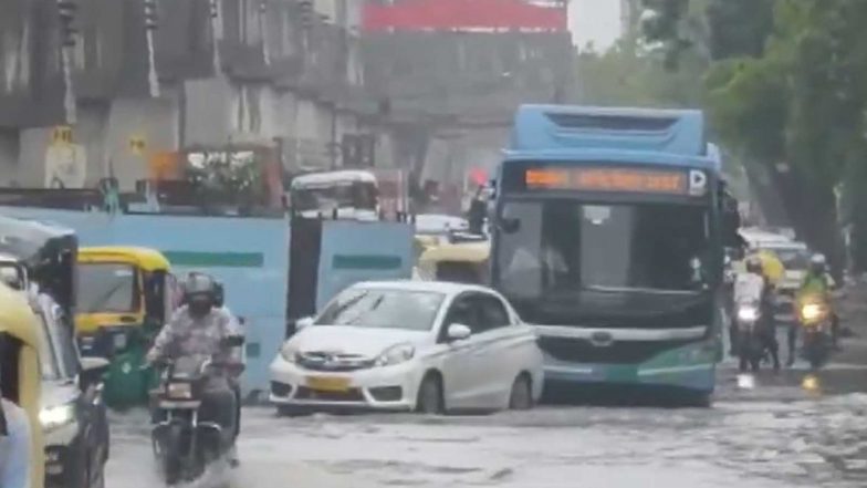 India News | Delhi-NCR Rain Fury: Severe Waterlogging and Traffic Snarls Paralyse City; Giant Trees Collapse in East of Kailash for Second Day