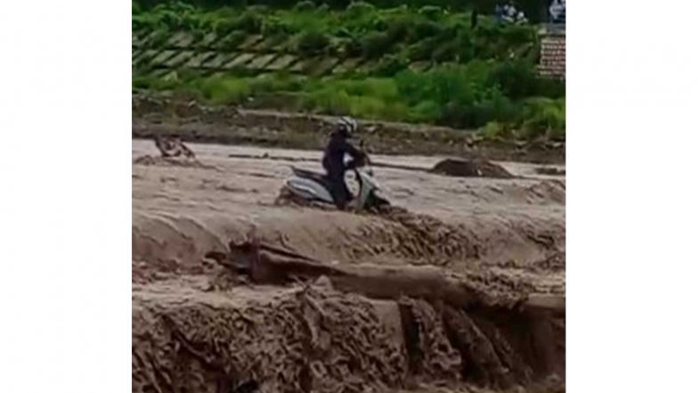 India News | Uttarakhand: Heavy Rain Raises Bin River Water Level, Disrupts Traffic on Rishikesh-Haridwar Chilla Road