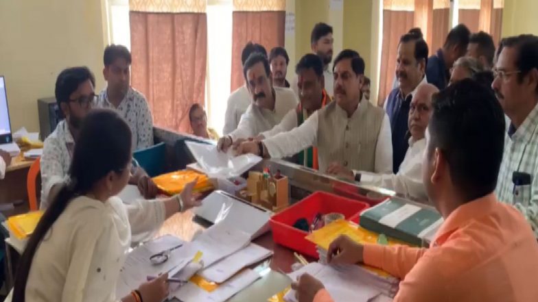 India News | MP: BJP Candidate Ashutosh Tiwari Files Nomination for Datia By-election, Narottam Mishra Gets Emotional During Nomination Rally