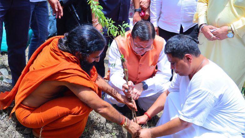 India News | Uttarakhand CM Dhami Plants Sapling with Baba Ramdev at Dhanvantari Dham on Harela