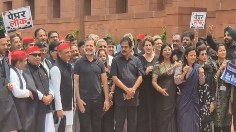 India News | Opposition MPs Stage Protest Against Govt at Parliament in Black Clothes, Congress Says Lakhs of Students Will Stand Up
