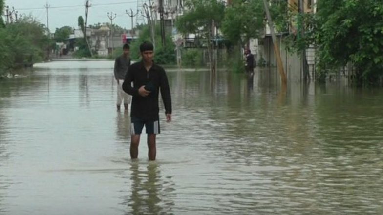 India News | Heavy Rainfall Inundates Parts of Surat Rural; Kim River in Spate, Traffic Disrupted