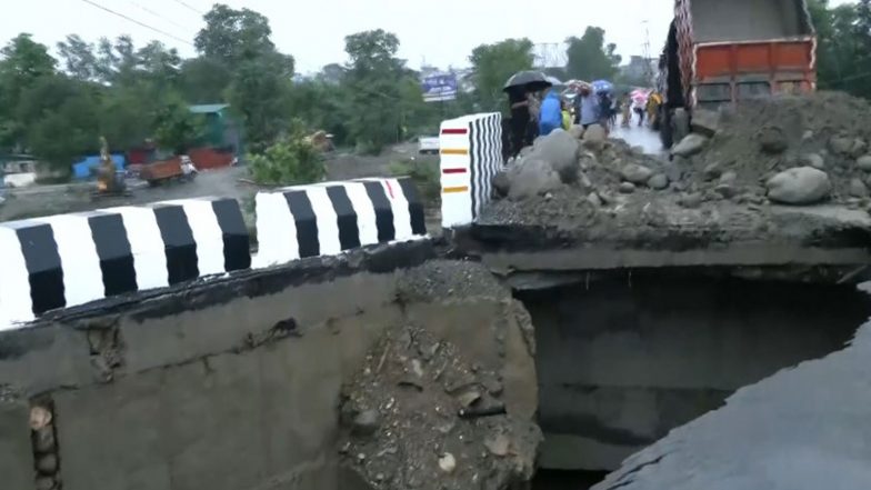 India News | Uttarakhand: Heavy Rain Causes Portion of Newly Constructed Bridge to Collapse