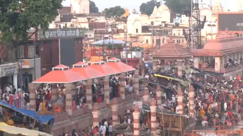 India News | Ayodhya: Devotees Take Holy Dip in Saryu River on the Occasion of Guru Purnima