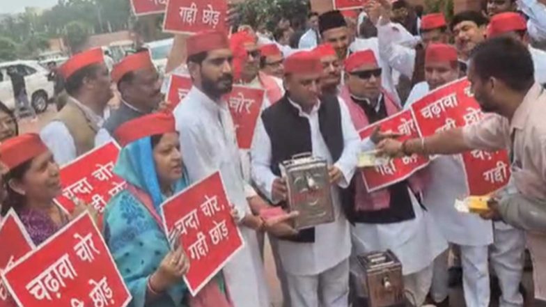 India News | 'Chadawa Chor, Gaddi Chor': SP MPs Led by Akhilesh Yadav Protest at Parliament over Alleged Ram Temple Donation Theft