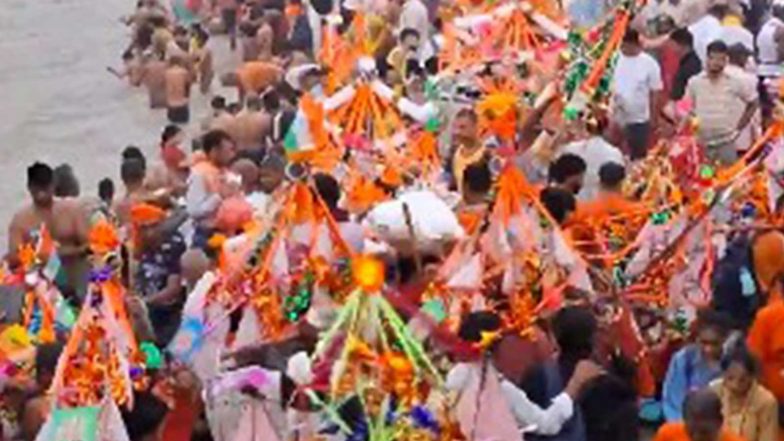 India News | Devotees Participate in Annual Kanwar Yatra in Haridwar as Shravan Begins