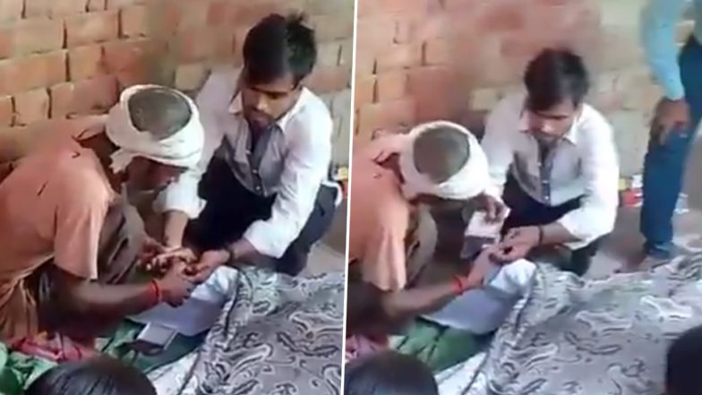Lucknow Viral Video: Man Caught on Camera Taking Dead Father&rsquo;s Thumbprint on Paper