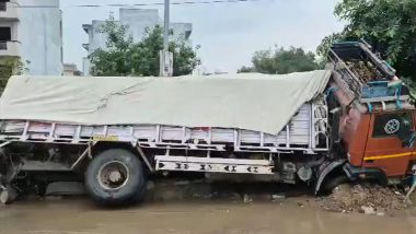 Gurugram: Heavy Rain Triggers Road Collapse in Sector 9, Cement Truck Sinks (Video)