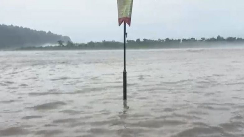India News | Ganga Flows Above Warning Level in Rishikesh as Heavy Rain Continues; SDRF Intensifies Evacuation, Awareness Drive