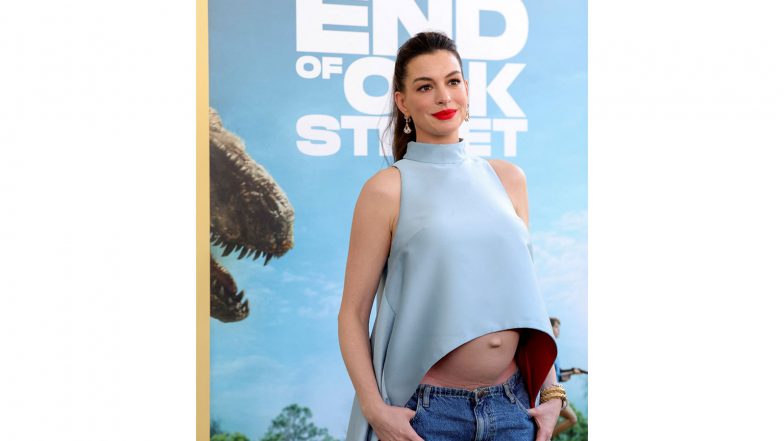 Entertainment News | Anne Hathaway Looks Beautiful as She Flaunts Her Baby Bump at LA Premiere of 'The End of Oak Street'