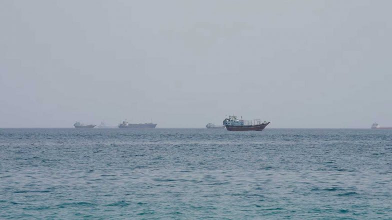 World News | Vessel Struck by Projectile While Transiting Strait of Hormuz: Report