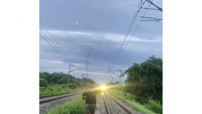 India News | Assam: Rajdhani Express Halted in Hojai to Allow Safe Crossing of Elephant Herd Through Railway Track