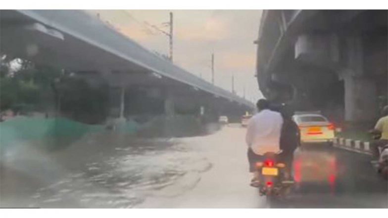 India News | Heavy Rain Triggers Waterlogging, Traffic Chaos in South Delhi, Airport Road