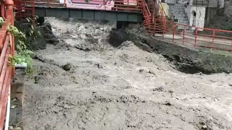 India News | Uttarakhand: Monsoon Rains Swell Tamasa River, Trigger Tree Fall and Vehicle Damage Near Dehradun's Tapkeshwar Temple