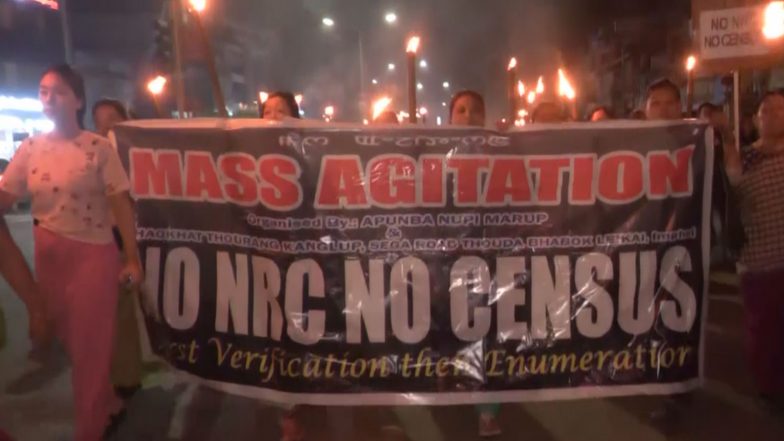 India News | Meira Paibi Activists Hold Massive Torch Rally in Imphal, Demanding NRC Update Before Census