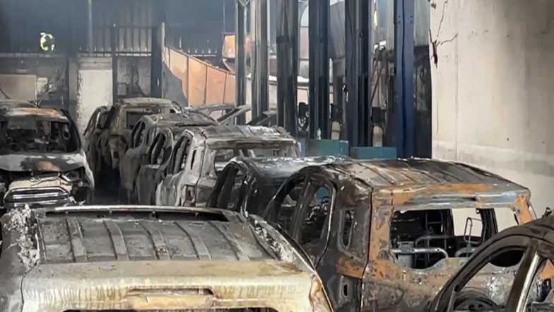 India News | West Bengal: Fire Breaks out Overnight at Car Showroom Near Kolkata International Airport, 30 Vehicles Reduced to Ashes