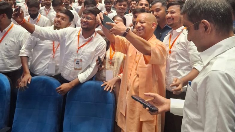 India News | UP CM Yogi Adityanath Takes Selfies with Youth After Distribution of Appointment Letters