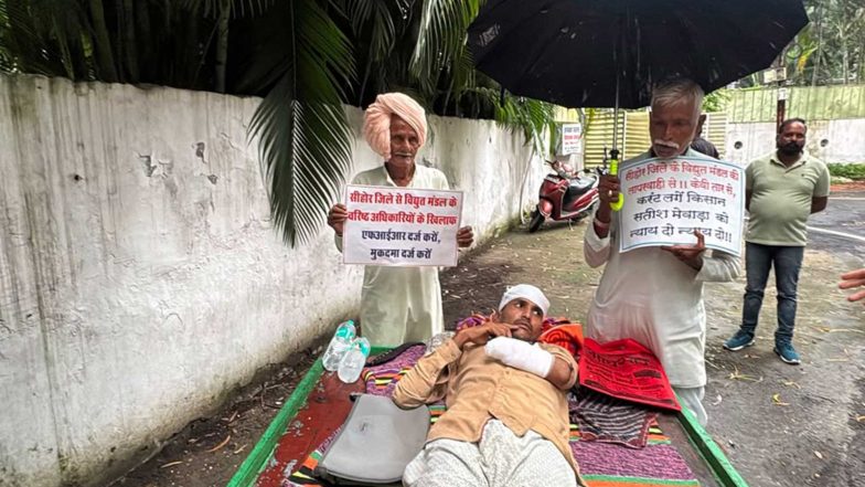 India News | MP: Farmer Allegedly Injured by 11-kV Power Line Arrives at Energy Minister's Bungalow on Handcart, Seeks Rs 25 Lakh Compensation, Govt Job