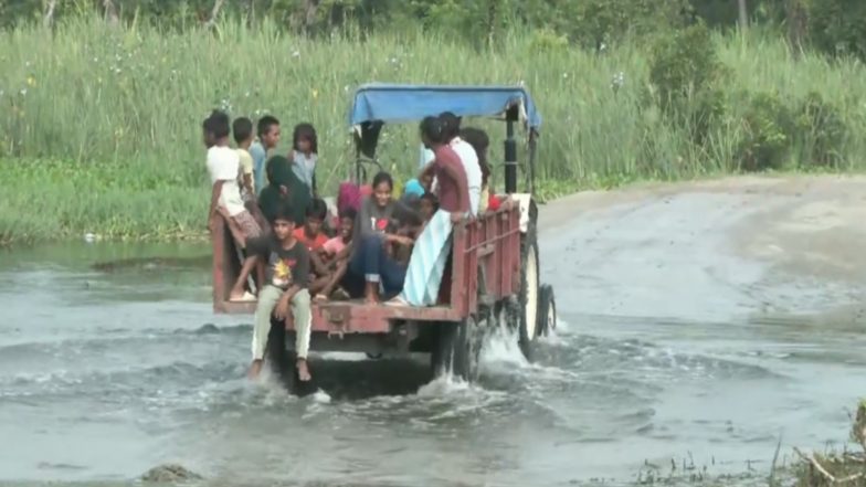 India News | UP-Bihar Border Villages on Alert Following Nepal Floods; Waterlogged Roads Disrupt Connectivity