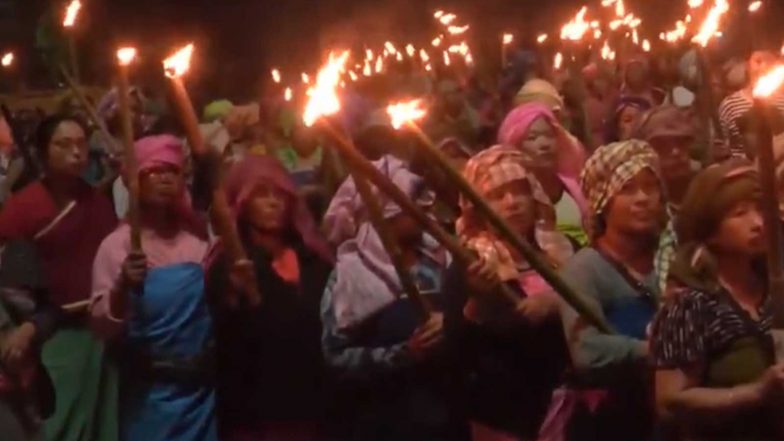 India News | Manipur: Meira Paibi Activists Hold Massive Torch Rally in Imphal, Demand NRC Update Before Census