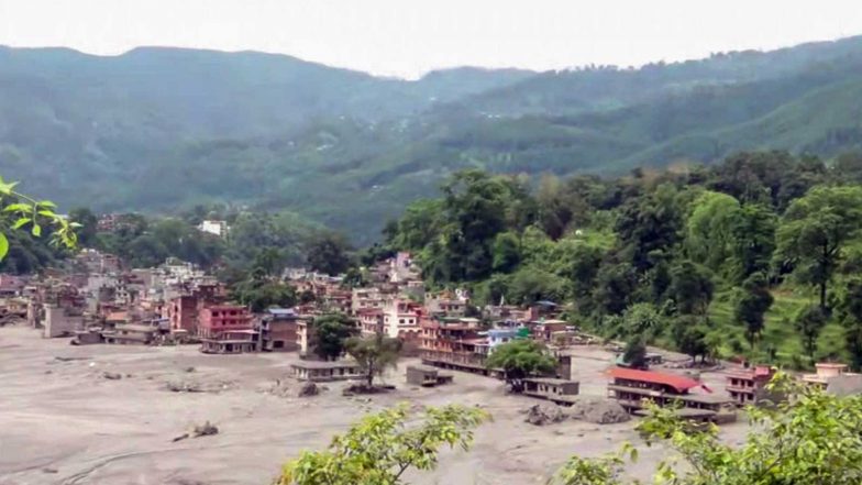 World News | Nepal Floods: Teenager Among Volunteers Distributing Relief to Stranded Families in Remote Villages