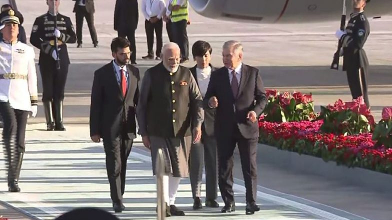 World News | PM Modi Reaches Uzbekistan, Accorded Warm Reception at Airport