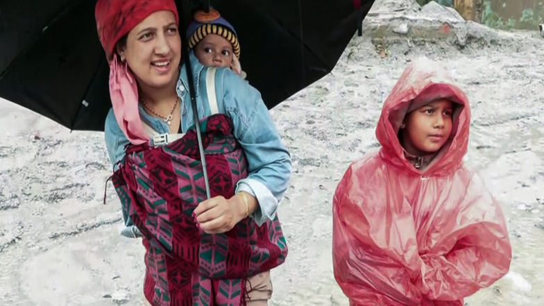 World News | Photos on a Wall: Families Search for Their Loved Ones Missing in Nepal Floods