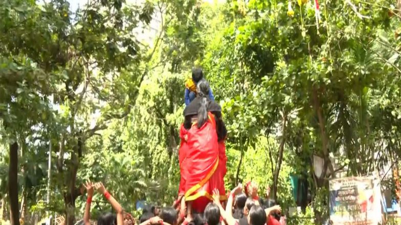 Entertainment News |  Dahi Handi: Girls Dressed in Red Sarees Form Human Pyramid, Deliver Message of Women Empowerment