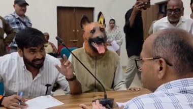 Khandwa: Opposition Leader Deepak Rathore Protests 'Stray Dog Sterilisation Scam' With Individual in Dog Costume (Videos)
