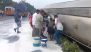 Palghar: Villagers Rush To Collect Milk After Tanker Turns Turtle on Mumbai-Ahmedabad Highway