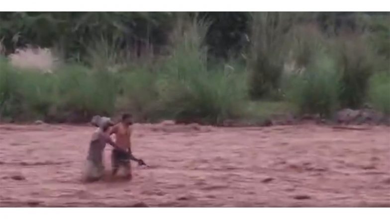 India News | Himachal Pradesh: IAF, NDRF Rescue 2 Stranded People from Middle of Surging Ran River in Nahan Town